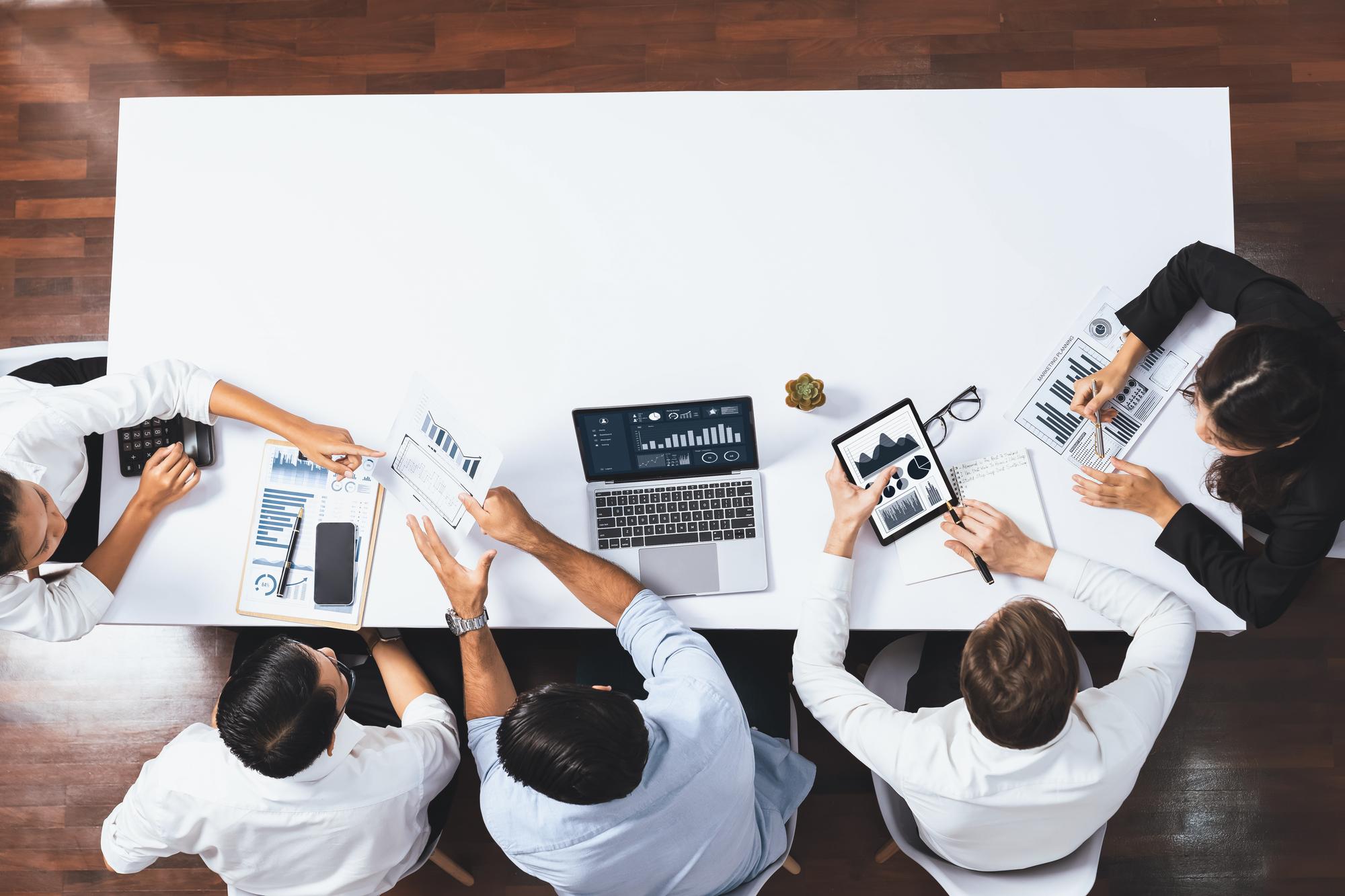 Workshop session with developers around table
